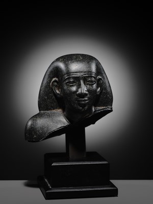 Lot 9 - AN INSCRIBED DIORITE BUST OF A ‘SOLE COMPANION’, SAITE PERIOD, DYNASTY XXVI