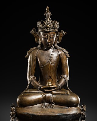 Lot 649 - A LARGE BRONZE FIGURE OF THE CROWNED BUDDHA, BURMA, ARAKAN STYLE, 17TH-18TH CENTURY