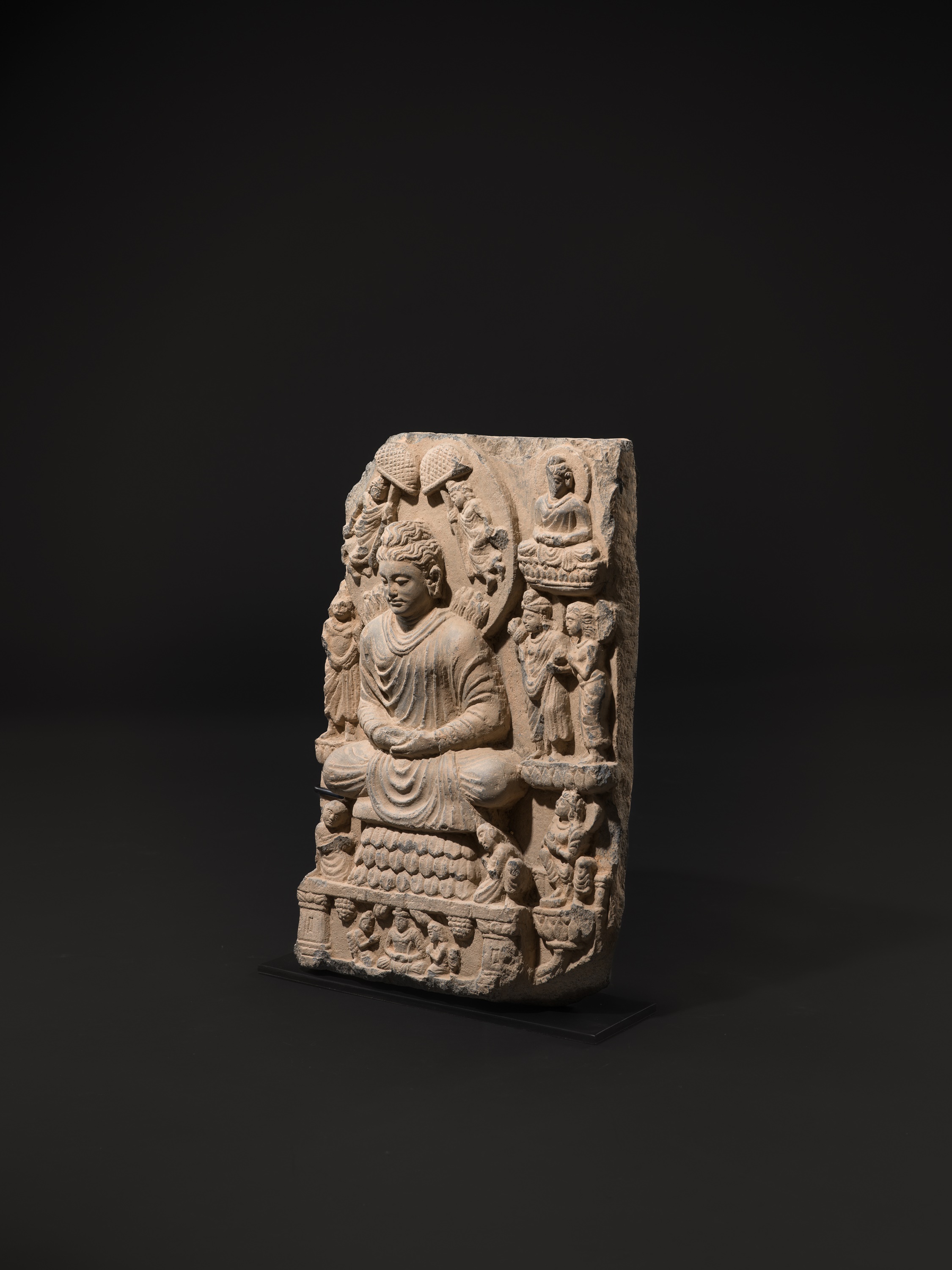 Lot 1479 - A GRAY SCHIST RELIEF OF BUDDHA SHAKYAMUNI,