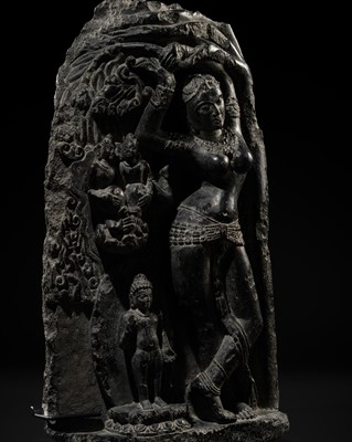 Lot 45 - A BLACK STONE STELE DEPICTING THE BIRTH OF GAUTAMA BUDDHA