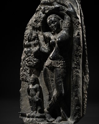 Lot 63 - A BLACK STONE STELE DEPICTING THE BIRTH OF GAUTAMA BUDDHA