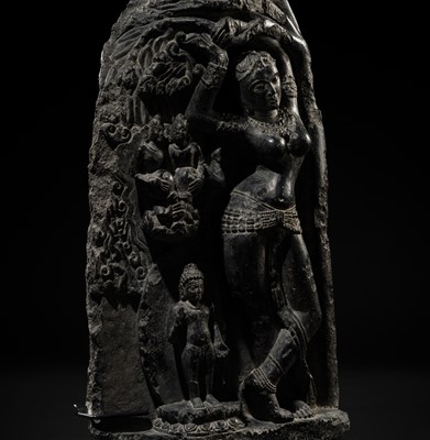 A BLACK STONE STELE DEPICTING THE BIRTH OF GAUTAMA BUDDHA