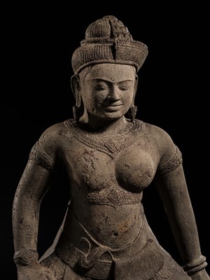 Lot 264 - A FINE SANDSTONE FIGURE OF ARDHANARISHVARA, ANGKOR PERIOD, 10TH-12TH CENTURY