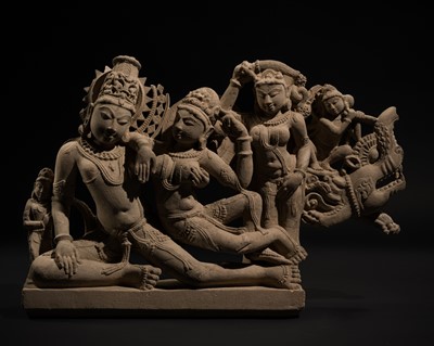 Lot 349 - A BUFF SANDSTONE STELE OF LAKSHMI-NARAYANA, RAJASTHAN OR MADHYA PRADESH, 11TH-12TH CENTURY