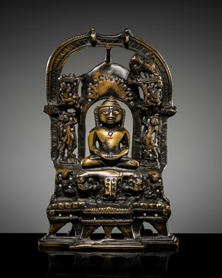 Lot 371 - A JAIN BRASS SHRINE OF A TIRTHANKARA, 1900s