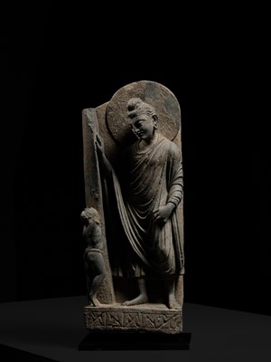 Lot 225 - A GRAY SCHIST FRIEZE OF BUDDHA DIPANKARA AND THE ASCETIC MEGHA, THE FUTURE BUDDHA SHAKYAMUNI, CIRCA 3RD CENTURY