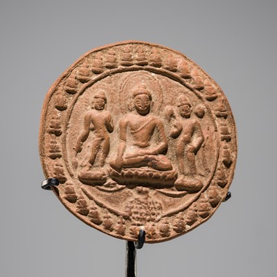 Lot 1419 - A TERRACOTTA VOTIVE PLAQUE WITH BUDDHA AND ATTENDANT BODHISATTVAS, 11TH CENTURY