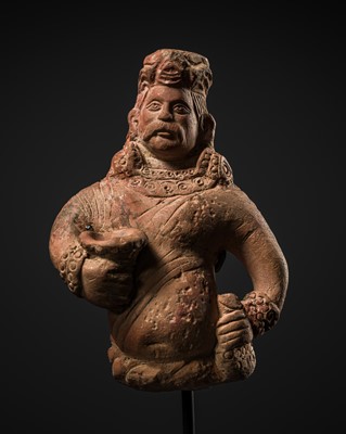 Lot 336 - A UNUSUAL TERRACOTTA FIGURE OF A MALE DEITY, GUPTA PERIOD, CIRCA 5TH-6TH CENTURY