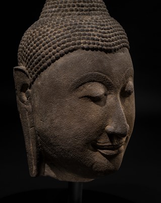 Lot 54 - A LARGE SANDSTONE HEAD OF BUDDHA, AYUTTHAYA KINGDOM