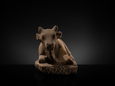 Lot 46 - A MAGNIFICENT SANDSTONE STATUE OF NANDI, PRE-ANGKOR PERIOD, 8TH-9TH CENTURY