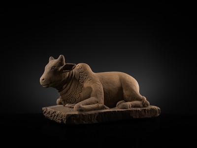 Lot 46 - A MAGNIFICENT SANDSTONE STATUE OF NANDI, PRE-ANGKOR PERIOD, 8TH-9TH CENTURY