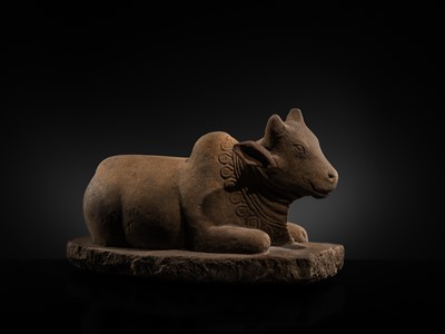 Lot 46 - A MAGNIFICENT SANDSTONE STATUE OF NANDI, PRE-ANGKOR PERIOD, 8TH-9TH CENTURY