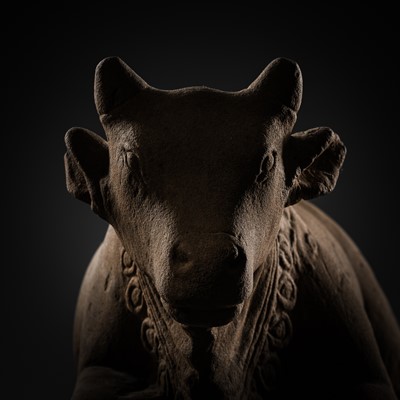 Lot 46 - A MAGNIFICENT SANDSTONE STATUE OF NANDI, PRE-ANGKOR PERIOD, 8TH-9TH CENTURY