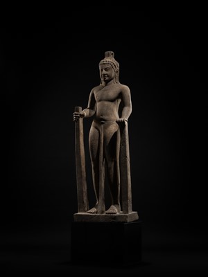 Lot 45 - AN IMPORTANT AND LARGE (131 CM) SANDSTONE FIGURE OF PARASHURAMA, PRE-ANGKOR PERIOD, PHNOM DA STYLE, 7TH CENTURY