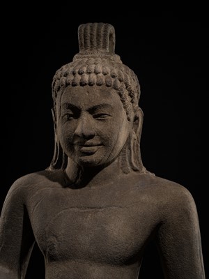 Lot 45 - AN IMPORTANT AND LARGE (131 CM) SANDSTONE FIGURE OF PARASHURAMA, PRE-ANGKOR PERIOD, PHNOM DA STYLE, 7TH CENTURY