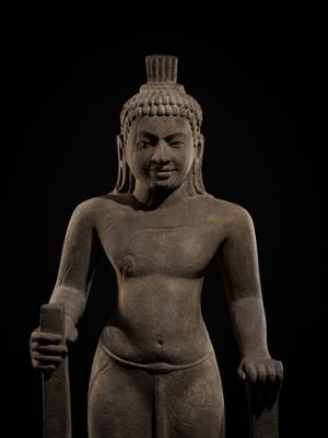 Lot 45 - AN IMPORTANT AND LARGE (131 CM) SANDSTONE FIGURE OF PARASHURAMA, PRE-ANGKOR PERIOD, PHNOM DA STYLE, 7TH CENTURY