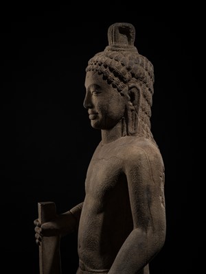 Lot 45 - AN IMPORTANT AND LARGE (131 CM) SANDSTONE FIGURE OF PARASHURAMA, PRE-ANGKOR PERIOD, PHNOM DA STYLE, 7TH CENTURY