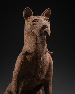 Lot 40 - A LARGE POTTERY FIGURE OF A SEATED GUARD DOG, HAN DYNASTY