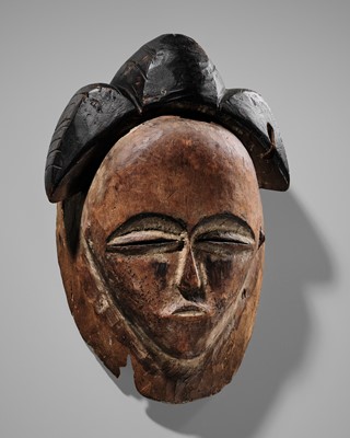 Lot 101 - A POLYCHROME WOOD PUNU MASK, OKUYI, 18TH-19TH CENTURY