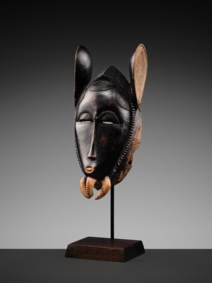 Lot 97 - A CARVED WOOD ‘ELEPHANT’ MASK, BAULE CULTURE, CÔTE D'IVOIRE, LATE 19TH TO EARLY 20TH CENTURY