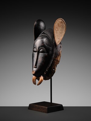 Lot 97 - A CARVED WOOD ‘ELEPHANT’ MASK, BAULE CULTURE, CÔTE D'IVOIRE, LATE 19TH TO EARLY 20TH CENTURY