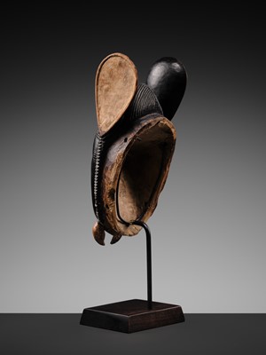 Lot 97 - A CARVED WOOD ‘ELEPHANT’ MASK, BAULE CULTURE, CÔTE D'IVOIRE, LATE 19TH TO EARLY 20TH CENTURY