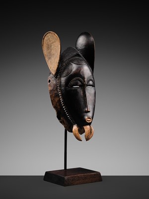 Lot 97 - A CARVED WOOD ‘ELEPHANT’ MASK, BAULE CULTURE, CÔTE D'IVOIRE, LATE 19TH TO EARLY 20TH CENTURY