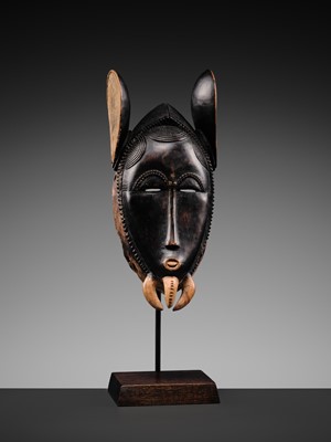 Lot 97 - A CARVED WOOD ‘ELEPHANT’ MASK, BAULE CULTURE, CÔTE D'IVOIRE, LATE 19TH TO EARLY 20TH CENTURY