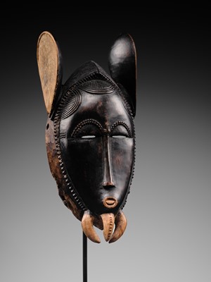 Lot 97 - A CARVED WOOD ‘ELEPHANT’ MASK, BAULE CULTURE, CÔTE D'IVOIRE, LATE 19TH TO EARLY 20TH CENTURY