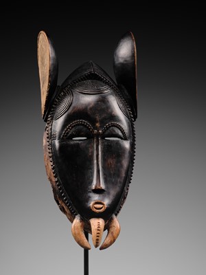 Lot 97 - A CARVED WOOD ‘ELEPHANT’ MASK, BAULE CULTURE, CÔTE D'IVOIRE, LATE 19TH TO EARLY 20TH CENTURY