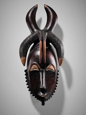 Lot 95 - A CARVED WOOD MASK, GYÈ, YAURE CULTURE, CÔTE D'IVOIRE, LATE 19TH TO EARLY 20TH CENTURY