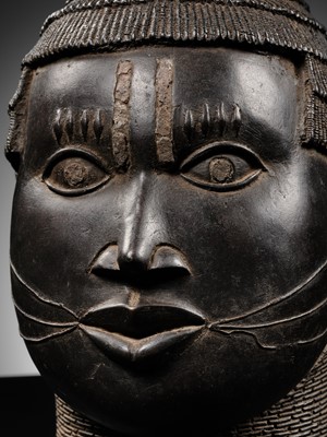 Lot 70 - AN IRON-INLAID BRONZE TROPHY HEAD, EDO PEOPLES, 18TH-19TH CENTURY