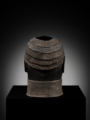 Lot 70 - AN IRON-INLAID BRONZE TROPHY HEAD, EDO PEOPLES, 18TH-19TH CENTURY