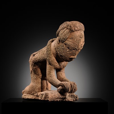 Lot 63 - A RARE TERRACOTTA FIGURE OF A WOMAN GRINDING, NOK CULTURE, NIGERIA, 500 BC – 200 AD