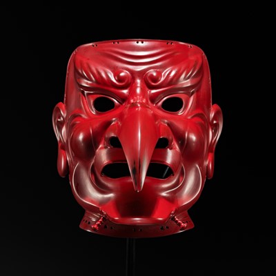 Lot 103 - FUKUTAKE ICHIRO: A MAGNIFICENT AND RARE RED LACQUERED IRON TENGU SOMEN