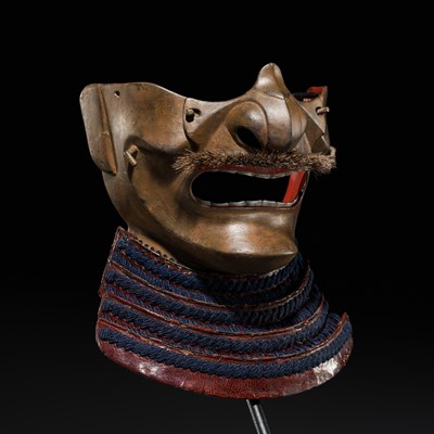 Lot 106 - A LACQUERED IRON IWAI SCHOOL MENPO