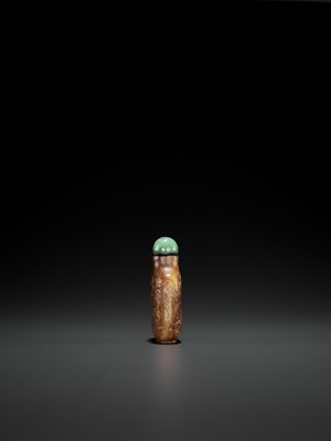 Lot 354 - A RUSSET JADE SNUFF BOTTLE, ‘MASTER OF THE ROCKS’ SCHOOL, QING DYNASTY