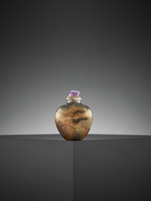 Lot 298 - A WHITE, GRAY AND RUSSET JADEITE ‘LUOHAN’ SNUFF BOTTLE, WANG HENG (1817-1882)