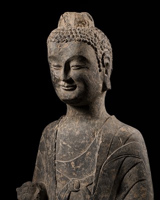 Lot 68 - A FRAGMENTARY LIMESTONE BUST OF BUDDHA SHAKYAMUNI, LATE NORTHERN WEI DYNASTY