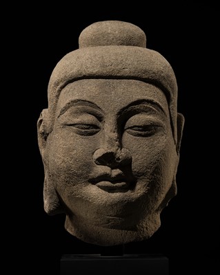 Lot 73 - A MONUMENTAL SANDSTONE HEAD OF BUDDHA, TANG DYNASTY