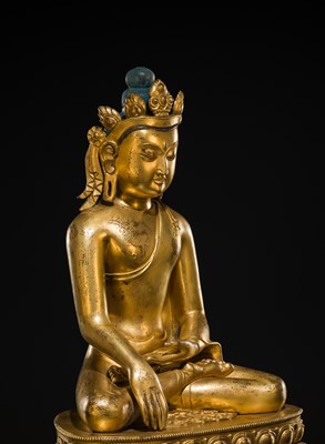 A LARGE GILT-BRONZE FIGURE OF CROWNED BUDDHA