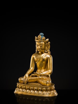 A LARGE GILT-BRONZE FIGURE OF CROWNED BUDDHA
