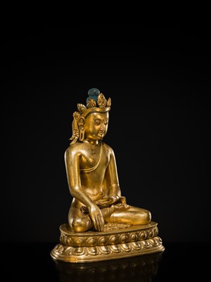 A LARGE GILT-BRONZE FIGURE OF CROWNED BUDDHA