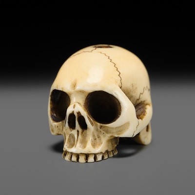 Lot 300 - A FINE IVORY OJIME OF A SKULL