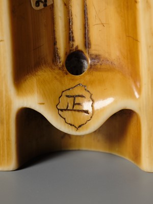 Lot 140 - HIDEMASA: A FINE OSAKA SCHOOL IVORY NETSUKE OF A SNAIL ON BAMBOO