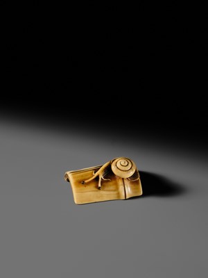 Lot 140 - HIDEMASA: A FINE OSAKA SCHOOL IVORY NETSUKE OF A SNAIL ON BAMBOO