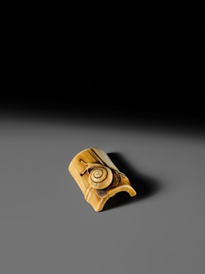 Lot 140 - HIDEMASA: A FINE OSAKA SCHOOL IVORY NETSUKE OF A SNAIL ON BAMBOO