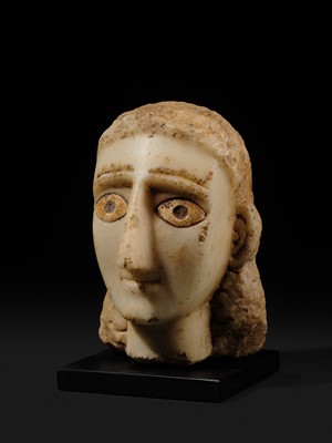 Lot 61 - A RARE ALABASTER HEAD OF A WOMAN, ANCIENT KINGDOM OF SABA