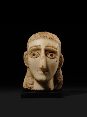 Lot 61 - A RARE ALABASTER HEAD OF A WOMAN, ANCIENT KINGDOM OF SABA