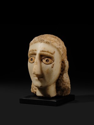 Lot 61 - A RARE ALABASTER HEAD OF A WOMAN, ANCIENT KINGDOM OF SABA
